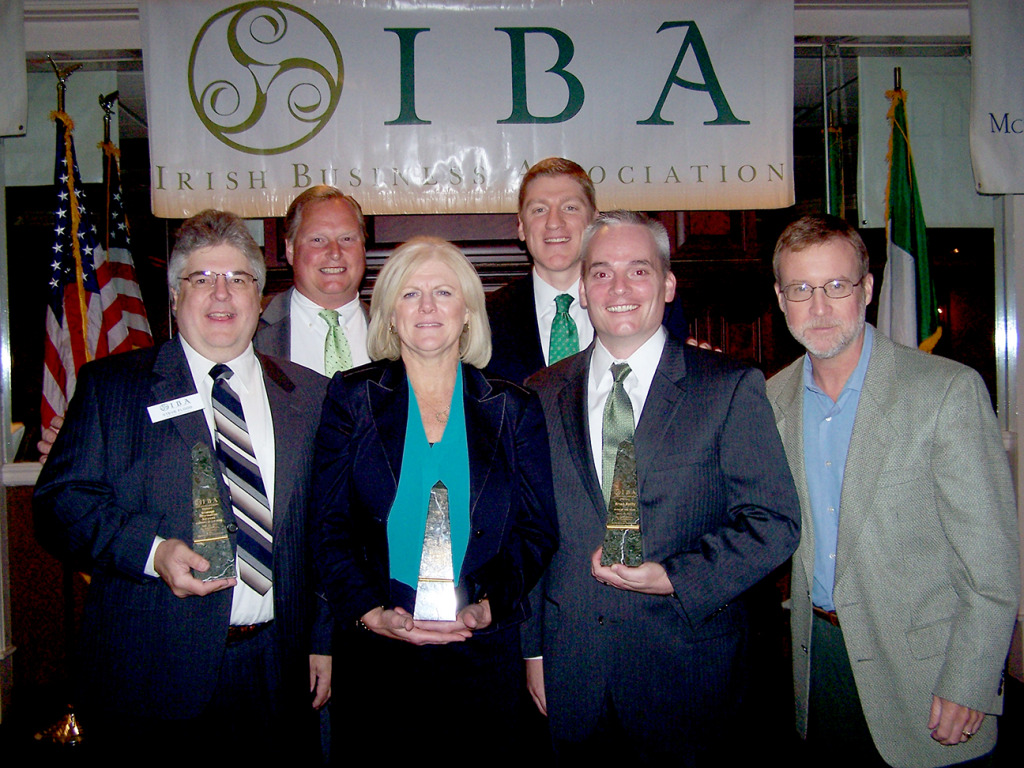 (above) The Irish Business Association (IBA) of New Jersey honored the honorees at its Seventh Annual Awards Dinner, held June 25 at the Westwood in Garwood, New Jersey.  (front row left to right) Steve Flood, owner of Scomage Information Services, Business of the Year; Woman of the Year Kathleen Connelly of Lindabury, McCormick, Estabrook & Cooper; and Man of the Year Brian Reilly of Centric Benefits Consulting. Joining them are (back row) Rich Callaghan of Capital Securities Management and event emcee, Tom Farrell of PMW Advisory Group and (front row right) Christopher Reardon of Reardon Communications Group.  