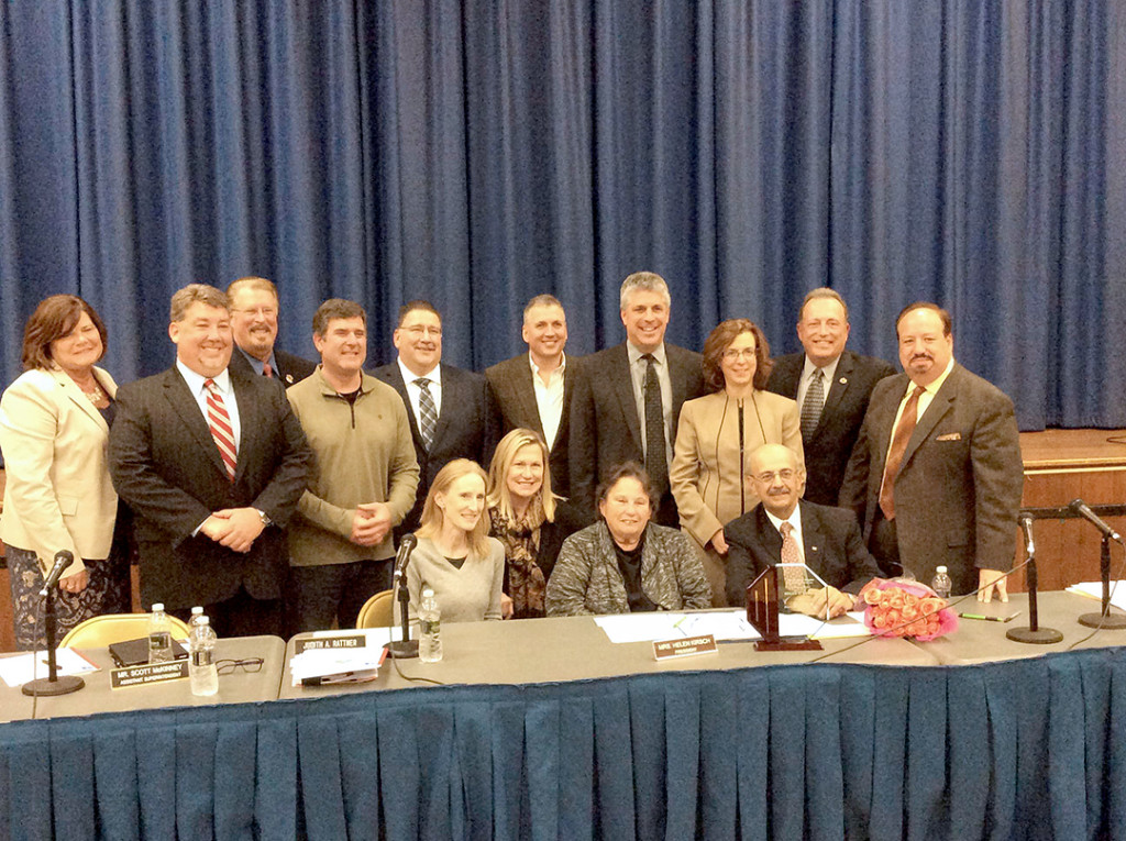 (above) Mrs. Kirsch is pictured here, seated, center, with current and former Board of Education members and administrators from Berkeley Heights who were among the many individuals who gathered to pay tribute to her.