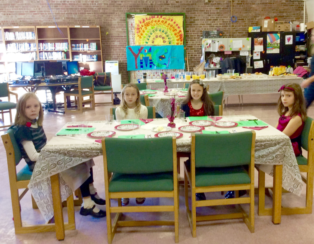 (above) A table of Girl Scouts wait with a mixture of anticipation and trepidation to see what the event will be like – they were pleasantly surprised.