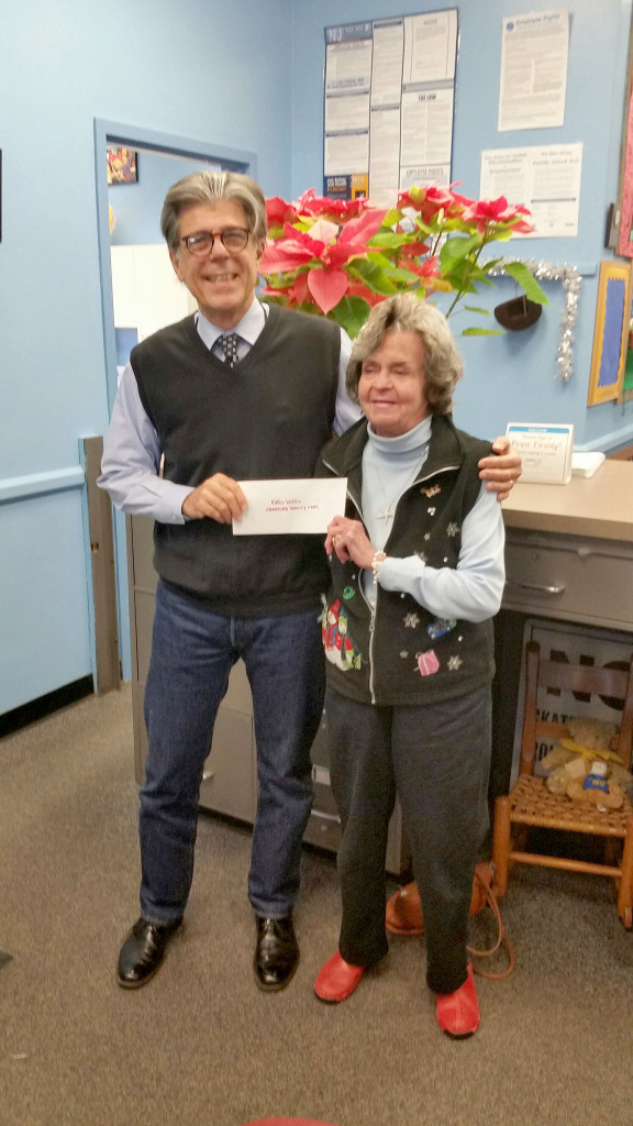 (above, l-r) WAS Principal Angelo Paternoster presents $1000 check to Cranford Family Care Kathy Willis.