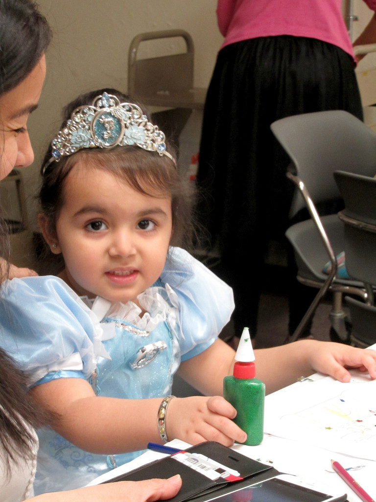 (above) Gianna Canepa, age 3, of North Plainfield decorates her royal crown and castle atSCLSNJ's North Plainfield Memorial Library branch's Princess Party on January 9.