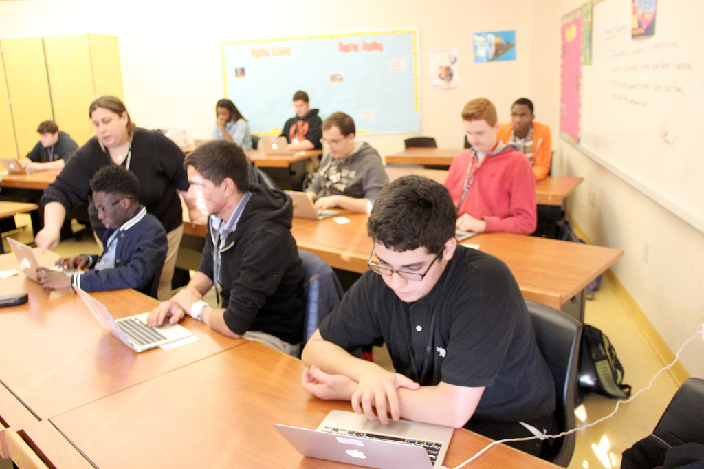 (above) Students are taught that the Hour of Code is explicitly designed todemystify codes and demonstrate that anyone can learn about the field of computer science.