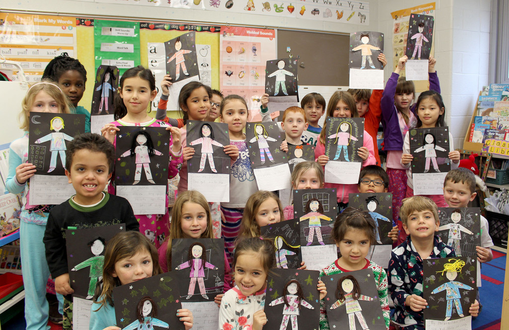 (above) First graders at Mt. Horeb School celebrate a successful winter break reading challenge.