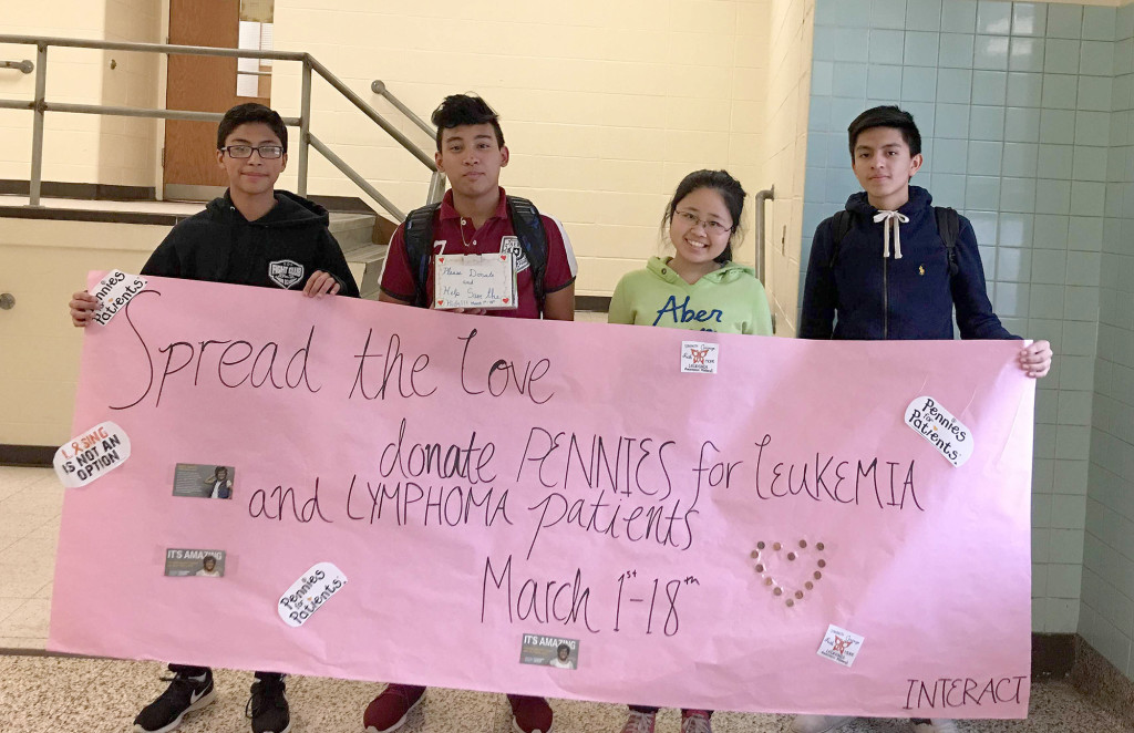 (above) North Plainfield High School Interact Club members display one of the banners that they created to raise awareness for the Pennies for Patients project.