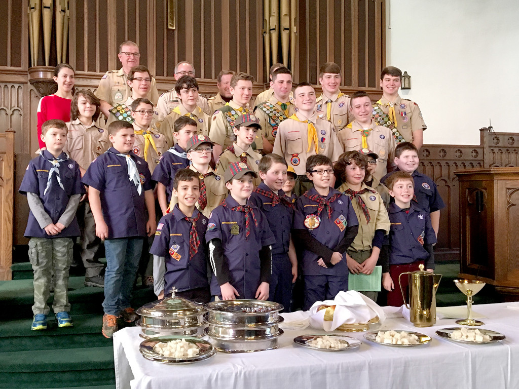 (above) Scouts from Boy Scout Troop 80, Girl Scout Troop 40525 and Cub Scout Pack 103 attended in their class A uniforms.
