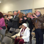 Grandparents in audience join in dancing