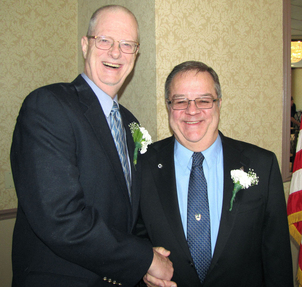 (above, r-l) Newly installed EMS Council of New Jersey President Joe Walsh of Neptune accepts congratulations from Howard Meyer of New Providence, who served as the organization's president for the past three years. Meyer, who has been an active, riding member of the Berkeley Heights Volunteer Rescue Squad for more than 40 years, will continue in his role as director of legislative affairs for the EMSCNJ. The installation took place Jan. 30 in Neptune.