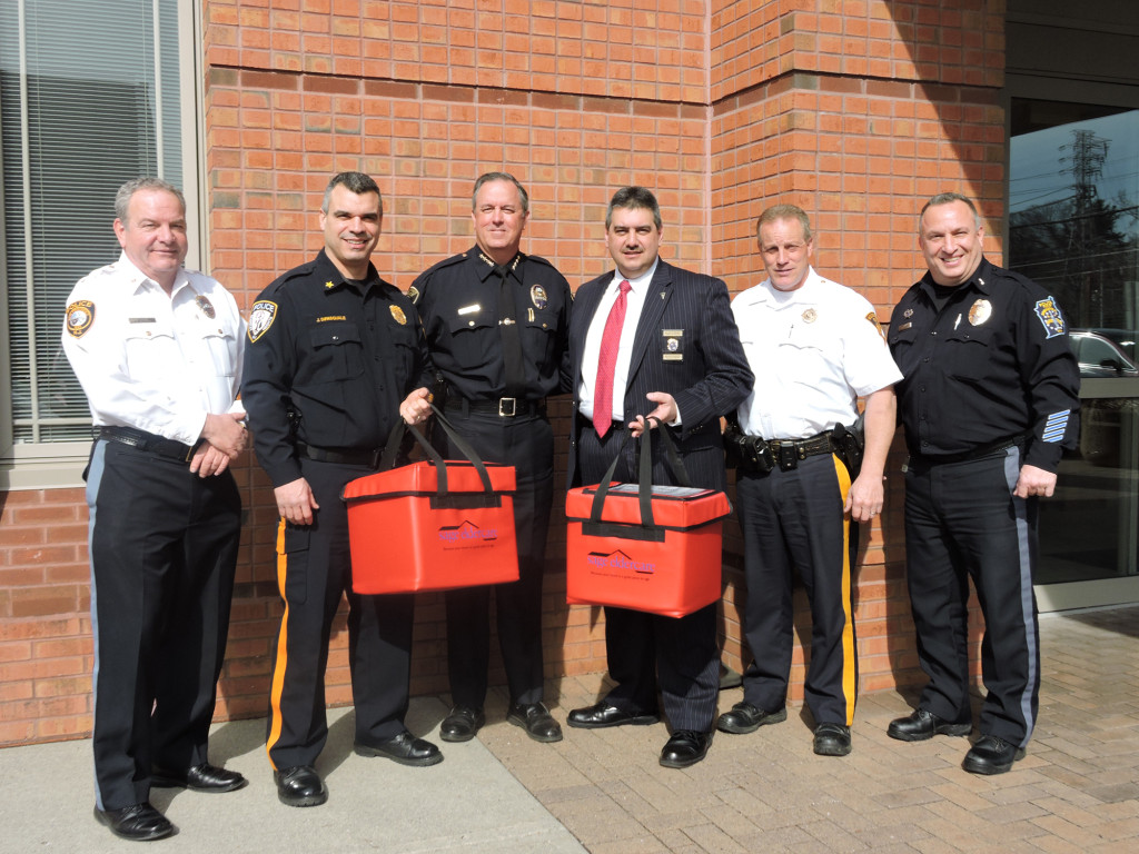 (above, l-r) New Providence Police Chief Anthony D. Buccelli, Jr., Berkeley Heights Police Chief John DiPasquale, Summit Police Chief Robert Weck, Mountainside Police Chief Allan V. Attanasio, Mountainside Lieutenant Tom Murphy, and Springfield Police Chief John Cook. They delivered meals to older residents in the area on March 16 as part of the Meals on Wheels America’s “March For Meals” annual campaign, which is coordinated by SAGE Eldercare in Summit.