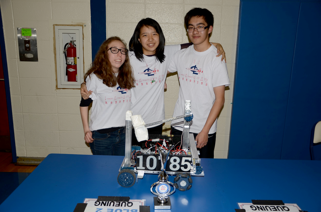 (above r-l) The team represented in the tournament, Michael Wu, Anna Song, and Beatriz Medeiros.