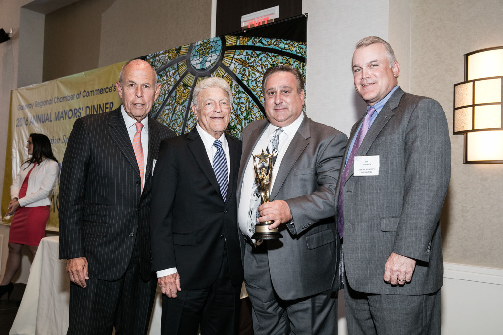 (above) Clark Mayor Sal Bonaccorso (second from right) was named the 2016 Mayor of the Year at the Gateway Regional Chamber of Commerce's Annual Mayor's Dinner. He is accompanied by (left to right) Eric Segal of Security Business Solutions and chairman of the chamber's Government Affairs Committee; John Laezza, the Clark Business Administrator; and Edward Gunther of Centric Benefits Consulting and chairman of the chamber's board.