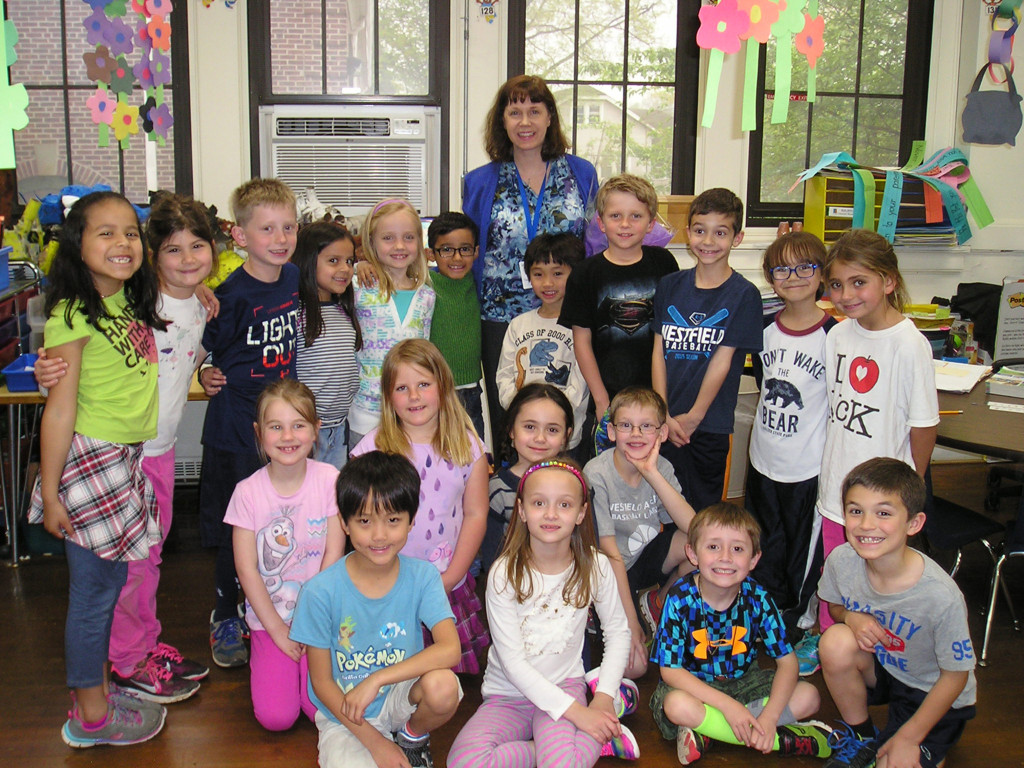 (above) McKinley Elementary School teacher, Susanne Bonhote, this year’s recipient of the Westfield Rotary’s Philhower Fellowship for outstanding teaching at the elementary grades, is surrounded by pleased and approving first graders in Miss Willis’s class.