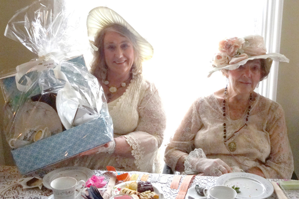(above) Karen Positan (left) and her mother Ruth Positan were two of the lucky prize winners at the Cranford Historical Society's "Victorian Hat Box Tea" which was held on May 21 at the Hanson House. Other winners were Carol Buccini, Angela Sibilia, Evelyn A. Hofmann, Dee Wolf, Linda Willner and Maureen Wakeman. As the attendees sipped tea and enjoyed little sandwiches and dessert, they were treated to a PowerPoint talk on the costumes of the popular British TV series "Downton Abbey" by Gail Alterman the society's Costume Curator. To celebrate the occasion, people were encouraged to dress in clothes from the period. Proceeds from the event went to the Crane-Phillips Museum grounds and the High School Scholarship Fund.