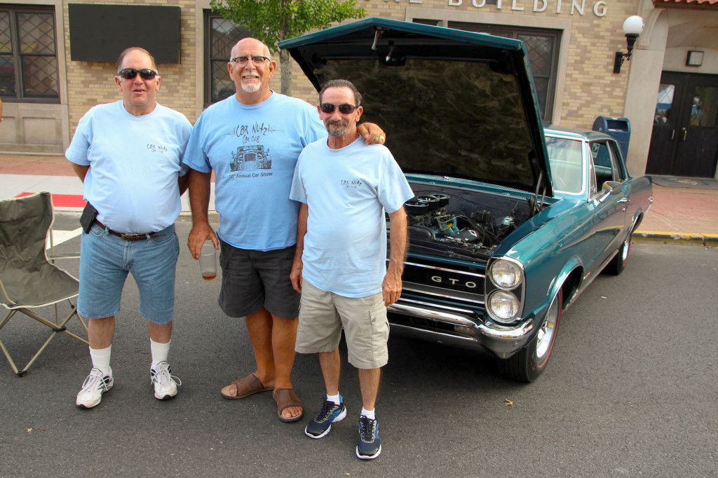 (above, l-r) Car Nutz Car Club members Ed Schaefer, Vice President; Dan Battista, President; Al Bender, Past President showing a ’65 GTO