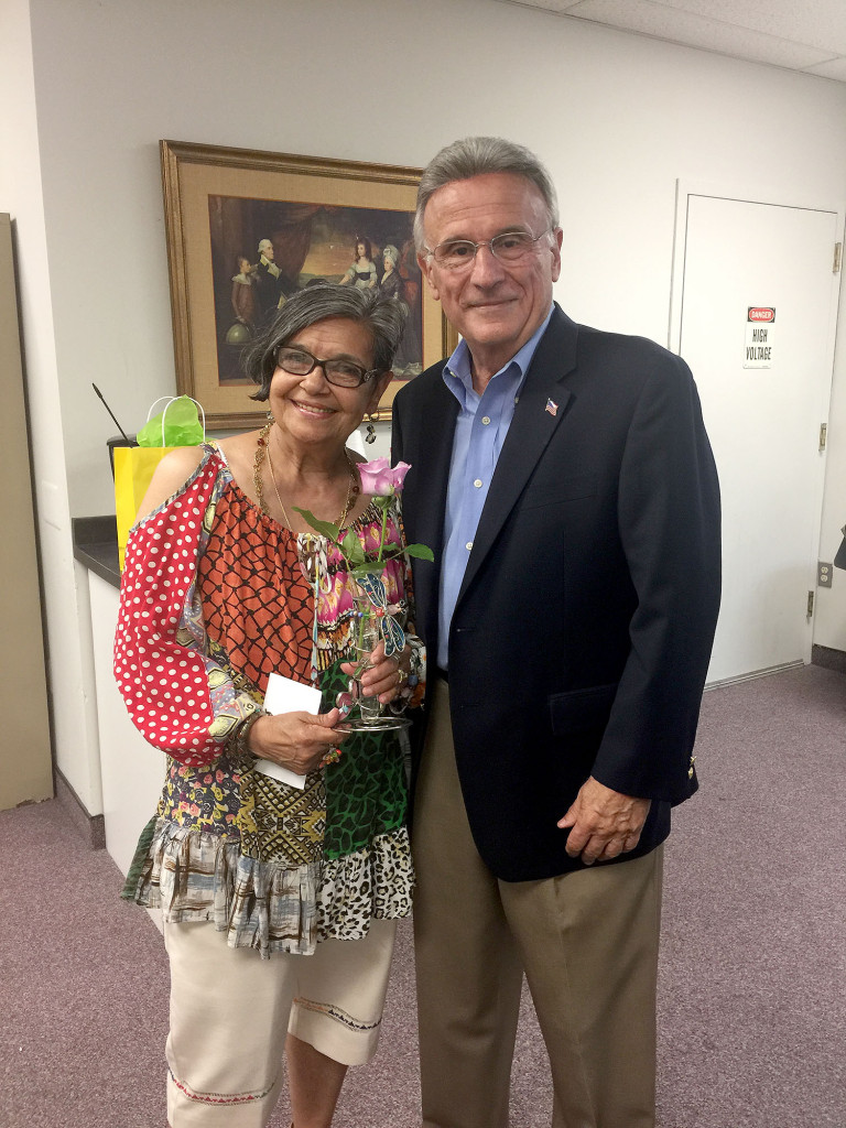 (above) The Township of Union Garden Club held their Annual Rose Contest in June at Town Hall. Entries were accepted from Garden Club members, and the submissions were required to be grown by Garden Club members as well. Committeeman Joseph Florio was on hand to congratulate the winner, Marie Dyke, whose rose won by one tie-breaking vote.