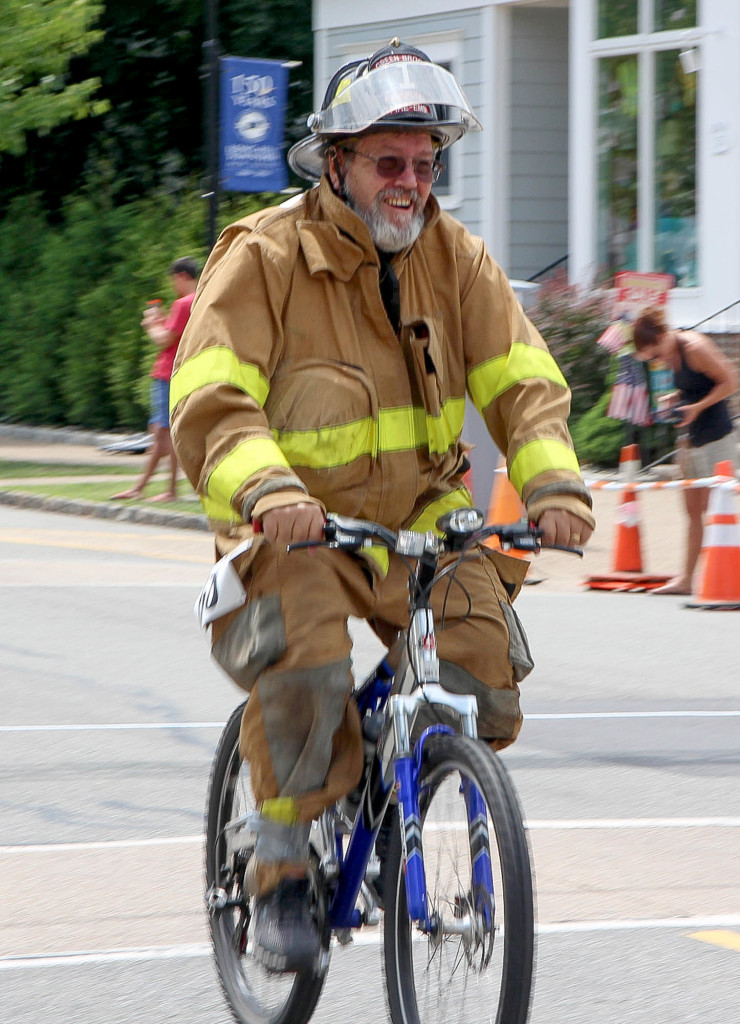 (above) Kenneth Larson Green Brook fire EMS at finish line. Larson was presented with the “Oldest Firefighter Racer Award”.
