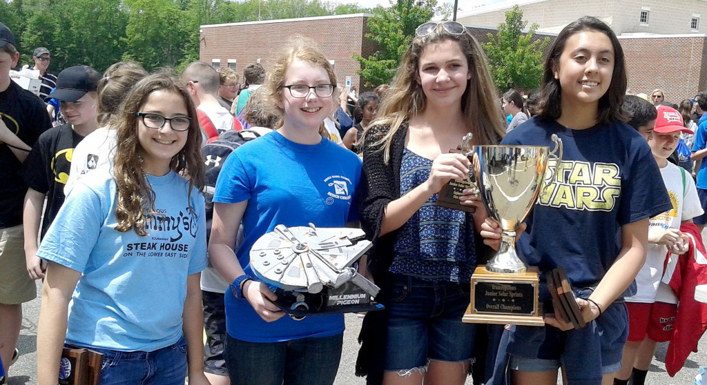(above l-r) Eliana Sussner, Esme Abbot, Sarah Young, and Anna Ramos won first place for their solar car, “The Millenium Pigeon” at the Junior Solar Springs intercounty finals held on May 23 in Florham Park, NJ.