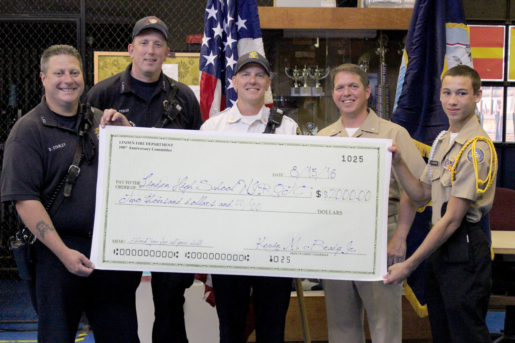 (above) The Linden Fire Department donated $2,000 dollars to the Linden High School ROTC program. The donation was for the ROTC’s help with The Linden Fire Department’s 100th Anniversary Celebration held on July 16th of this year. Pictured presenting the check are 100th Anniversary Committee Chairman Deputy Chief Kevin Brady and 100th Committee members Firefighter Mathew Pribish and Firefighter Daniel Stanley. Accepting the check are ROTC Representatives Commander Boyd Decker and Cadet Command Master Chief Kyle Grunder.