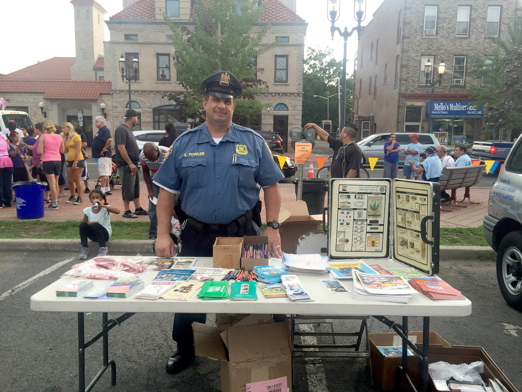 (above) Officer Fowler helping the community learn more about drugs and alcohol through photos, booklets and brochures.