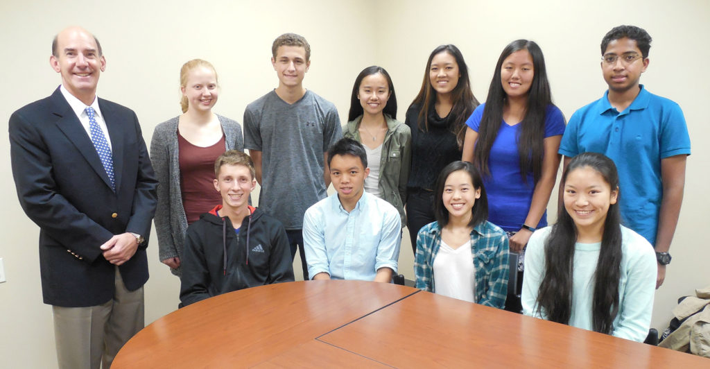 (above) Ten Watchung Hills Regional High School (WHRHS) students in the Class of 2017 have been named semifinalists in the National Merit Scholarship Program. WHRHS Principal George Alexis, standing left, congratulates the semifinalists: (seated, l-r) Gavin Van Skiver of Warren Township, Daniel Lee of Watchung, Jenny Yan of Warren Township, and Michelle Shui of Green Brook Township; (standing, l-r) Caroline Rucker and Jonathan Rich of Warren Township, Joyce Zhou of Green Brook Township, and Natalie Kim, Nicole Wang and Karthik Irakam, all of Warren Township.