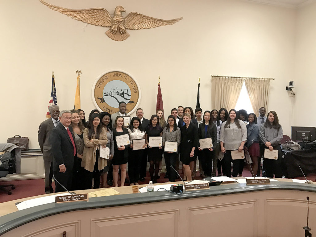(above) Mayor Manuel Figueiredo, Deputy Mayor Suzette Cavadas, Committeewoman Michele Delisfort, Committeeman Joseph Florio, Committeeman Clifton People, Jr., and the pupils of Union High School’s “Student Government.” Photo Courtesy of the Township of Union