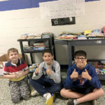 Scouts Edward Walker Michael Armao and Laurence Gibson at Mt Horeb School