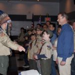 Warren Boy Scout Receiving arrows from Cubmaster Adam Gioia