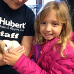 Jennifer Ross, 7, shows her love for kitties