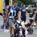 Johnson Football Visits First Children’s School