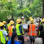 Youth-getting-instruction-on-Riverbank-restoration-plan